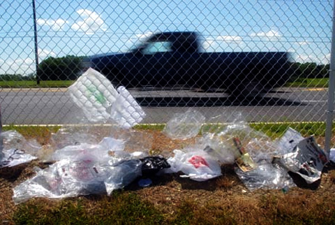 Plastic bags on side of road