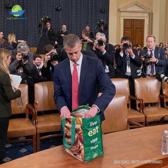 Steve Castor in front of Congress unpacking a reusable grocery bag