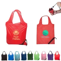 An assortment of custom foldable shopping bags that collapse into a berry shaped package.
