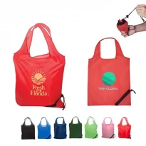 An assortment of custom foldable shopping bags that collapse into a berry shaped package.