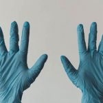 Hands in PPE Gloves