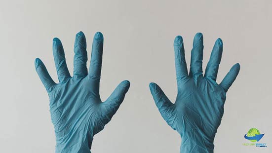 Hands in PPE Gloves