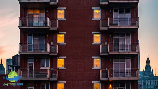 Play multi-family dwelling building during evening sunset