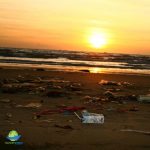 Excessive amounts of beach pollution seen at sunset