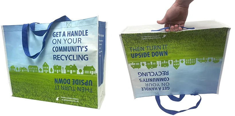 Reusable recycling bags for municipalities with bottom handle to encourage recycling participation.